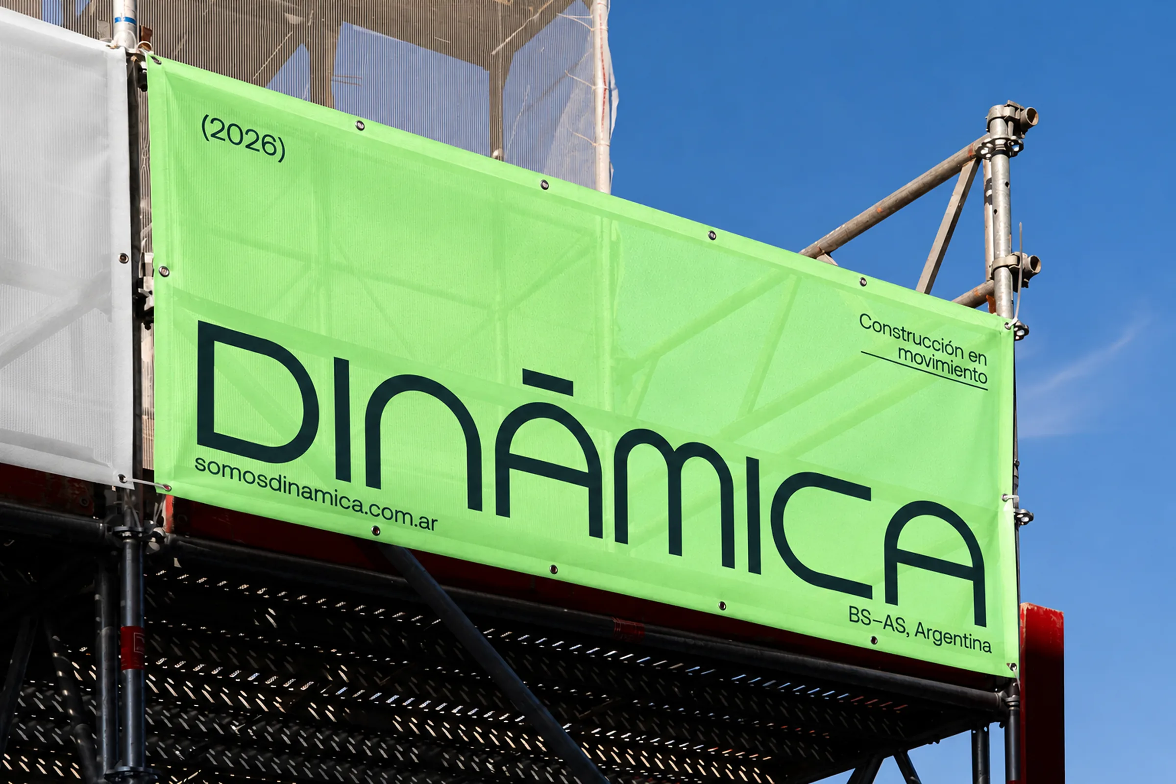 Dinámica lime banner on a construction site
