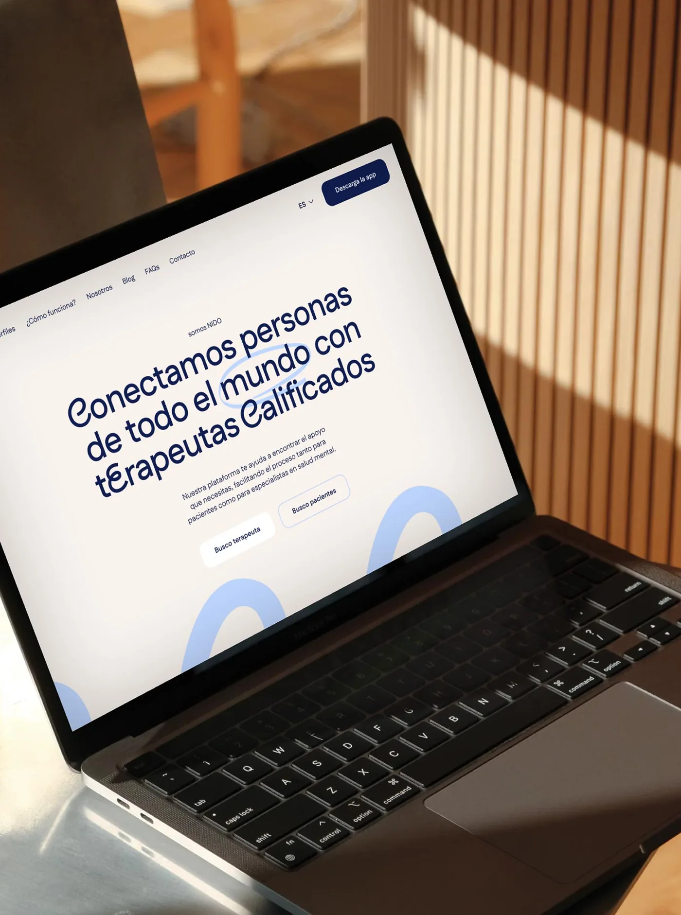NIDO website on a laptop